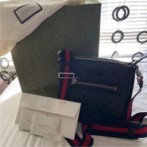 Gucci black GG messenger bag